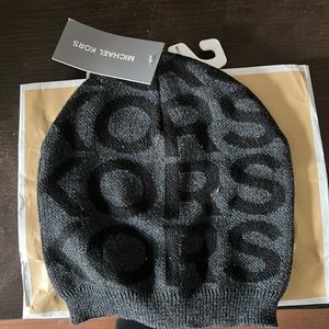 Brand new grey MK Michael Kors hat never worn with tags.